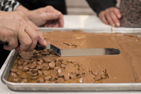 Melting milk chocolate over toffee