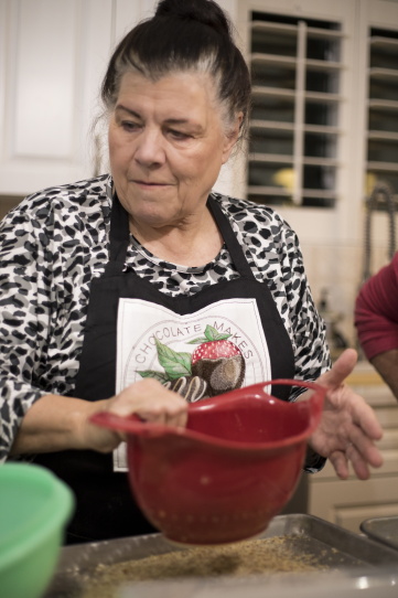 Carla prepping nuts for candy making class