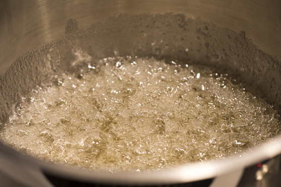 Fondant candy boiling in a pot