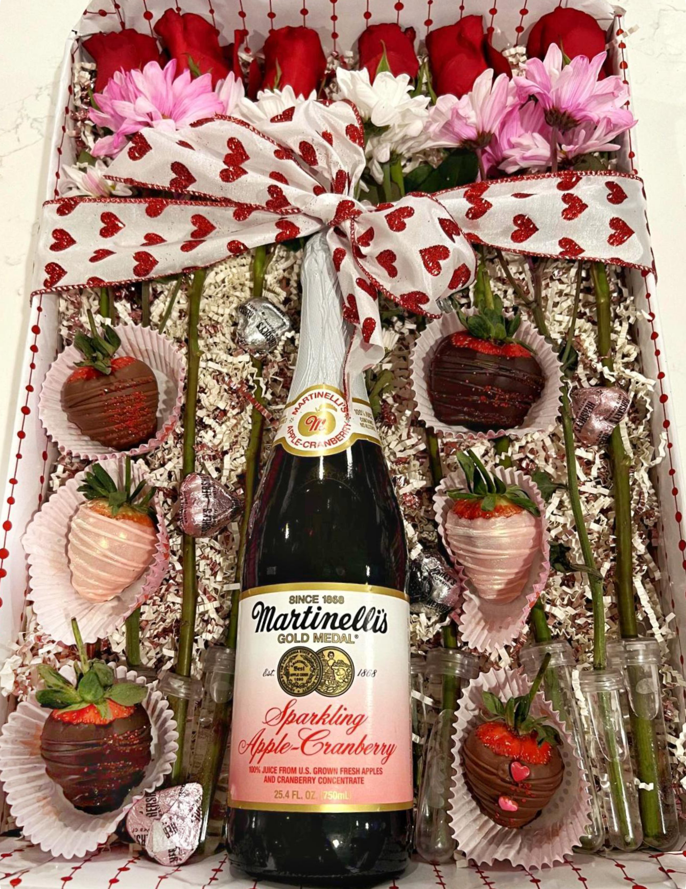 Valentines box with roses and chocolate-dipped strawberries