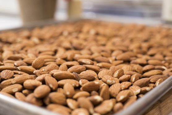 Pan of freshly roasted whole almonds