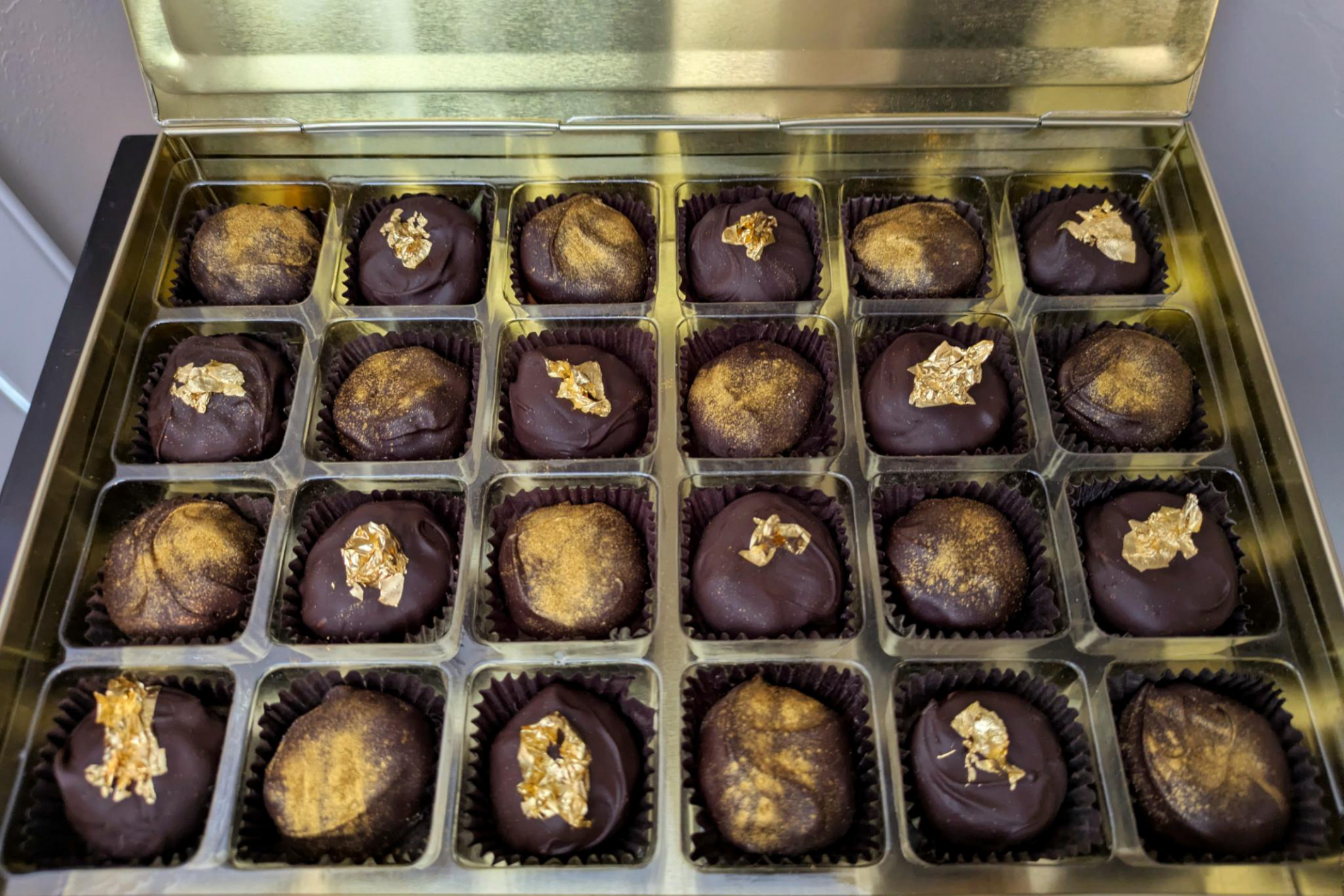 Box of gold dusted, hand-dipped chocolates