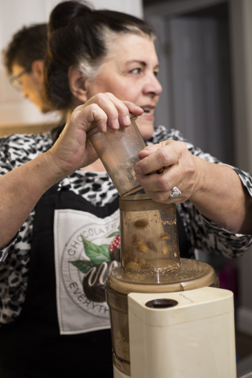 Carla processing almonds for burnt sugar chocolates